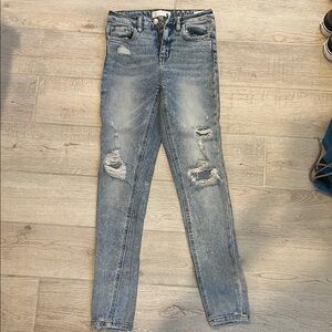 Blue Skinny Distressed Jeans with Faded Wash